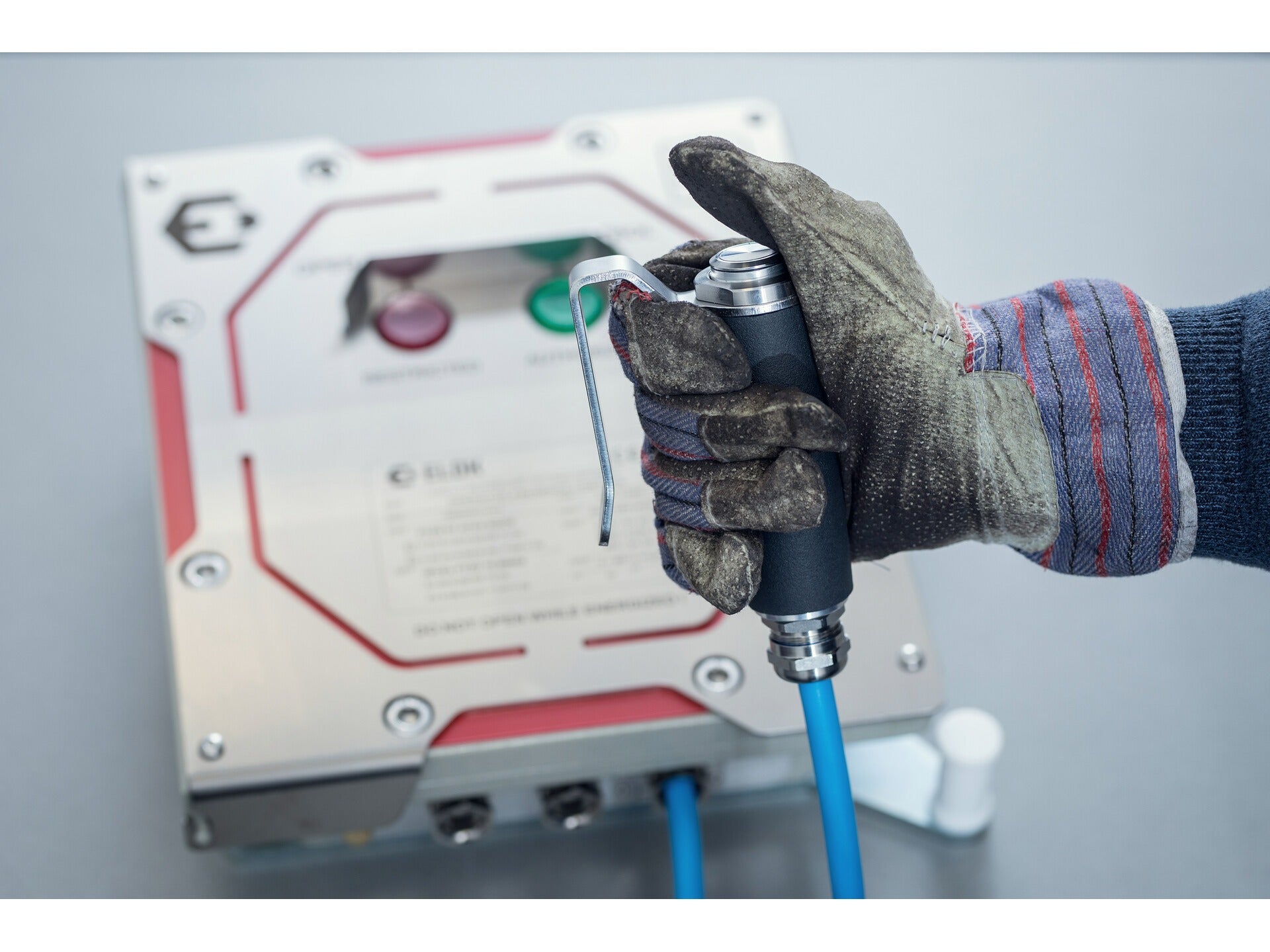 Operator attendance safety control with switch and cable