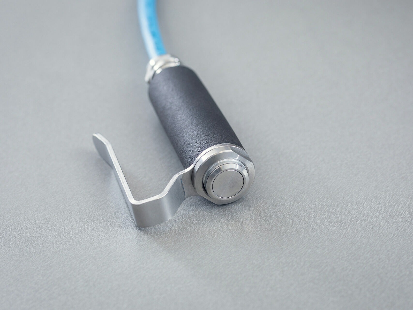 Operator attendance safety control with switch and cable